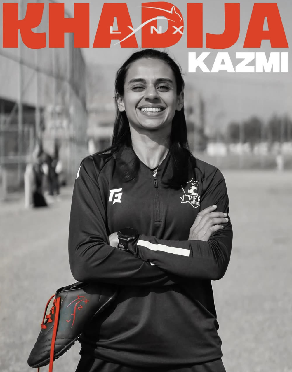 Khadija Kazmi holding a pair of LYNX boots in PFF training kit